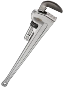 A large silver pipe wrench with an adjustable jaw and a long handle is positioned diagonally. The metal tool appears industrial and robust.